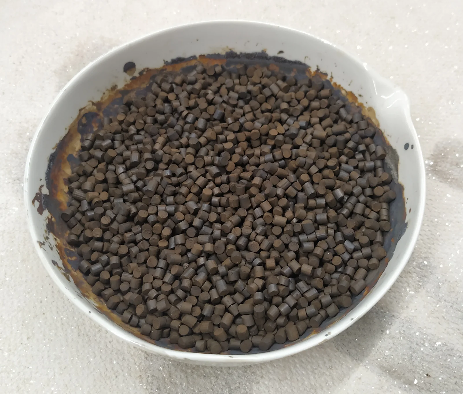 Finished batch of catalyst pellets, ready for installation inside the full-scale decomposition chamber
